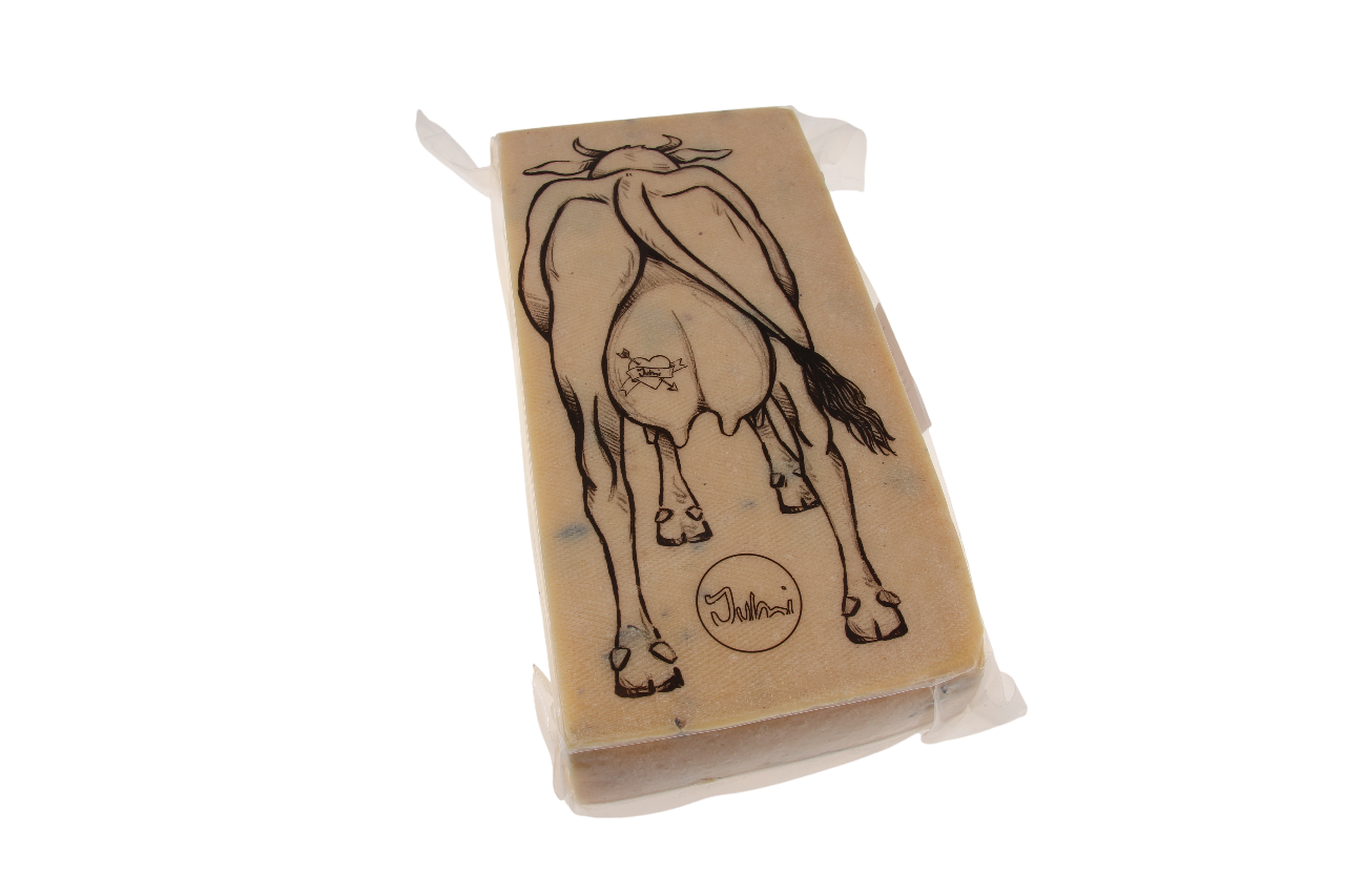 Feiner Schweizer Raclettekäse mit schwarzem Trüffel, aus naturbelassener Rohmilch hergestellt – jetzt bei kaeseversand24.de entdecken